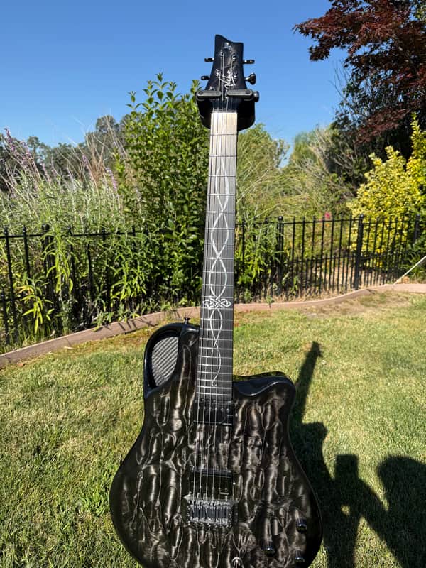 Emerald Virtuo 2024 Translucent Black Quilted Maple image 1