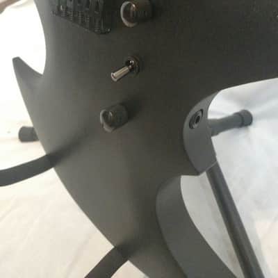 Trinity Bat-el'-ax image 4