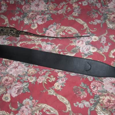 lite use RockYou (Rock You) PU Faux Leather Snakeskin Pattern Guitar Strap (front: brown, tan, black pattern) (back: black) reversible - main part of strap 2 & 3/4" wide, belt part 1 & 1/4" wide [polyurethane leather] Adjustable Length from 44" to 53" image 25