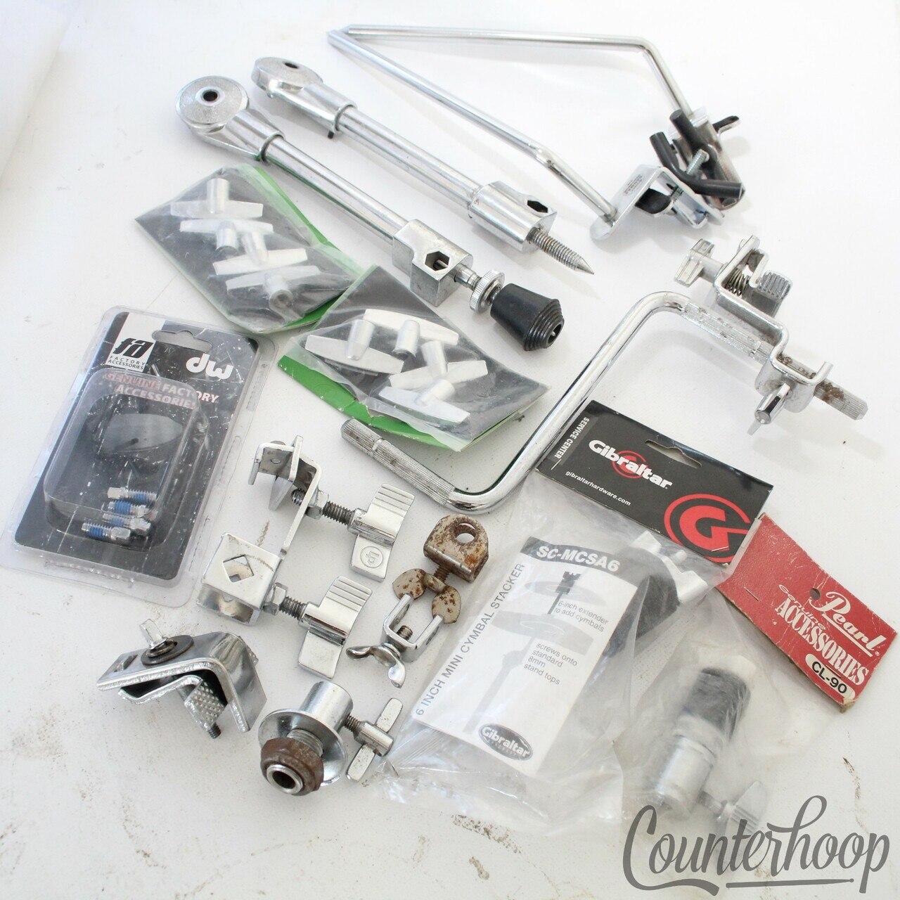 Parts Lot-Pearl Hi-Hat Cymbal Clutch, Danmar Clamp-On Bass Drum Spurs DW Screws — main photograph