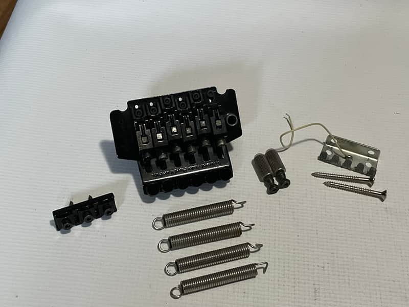 1990's Jackson Dinky Guitars JT-580LP Takeuchi Black Licensed Floyd Rose Tremolo Guitar Bridge image 1
