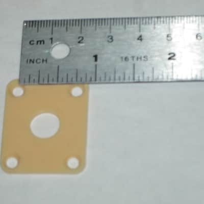 used (has some nicks & scratches) unknown brand CREME PLASTIC RECTANGLE Jack Plate + nickel finish SCREWS (refer to measurements in description) flat - but will flex when installed, might fit Epiphone LP 100 model guitar (NO guitar included) image 10