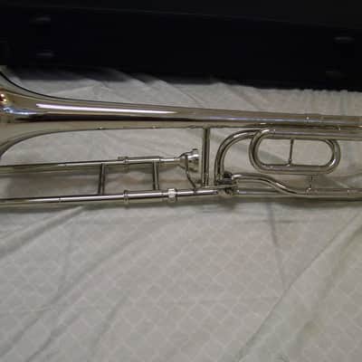 Silver Trigger trombone, with case and mouthpiece image 5