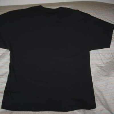 new old stock genuine Fender Heaven's Gate Custom Shop 100% Cotton Black Short Sleeve T-Shirt, XXL (XX-Large) (part #): 9101040806, early 2010s, GRAPHIC: Tan, Blue, Brown, Black (cross, 2 guitars, floral swirl, Fender, Custom Shop) NO: hang tag/packaging image 9