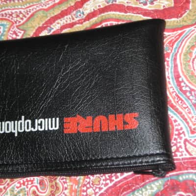 lightly used very clean 1980s Shure microphone pouch, outer areas are black vinyl with a very light reptile texture/appearance & one area has a red & silver graphic / inside is black / black zipper (NO microphone) 10 inches W, 4 & 1/2 inches H image 16