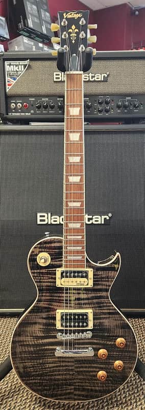 Full Warranty NEW OPEN BOX W/Canvas Gig Bag, Wall Hanger & Accessory Bundle Vintage V100-TBK Reissued Series Single Cut 2010s - Flamed Trans Black image 1