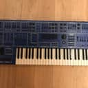 Oberheim OB-12 1990s -  Recently cleaned and new blue LCD screen installed