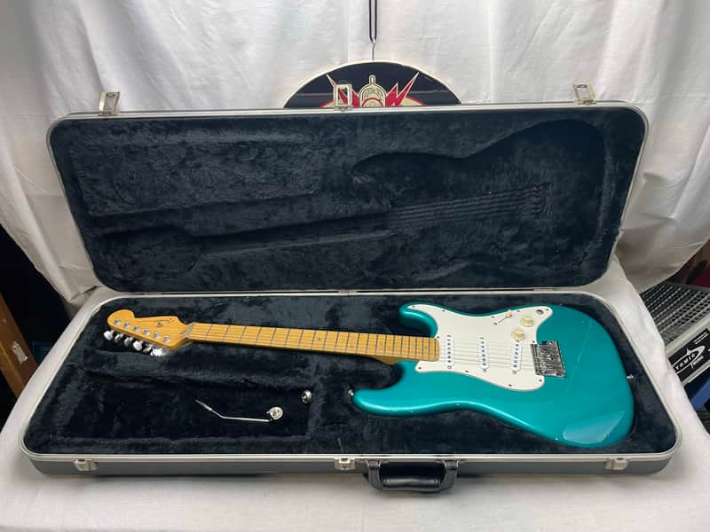 Fender PARTS Stratocaster - 1999 American Deluxe neck on 1983 Dan Smith-era Standard Strat body with Case - Transparent Teal image 1