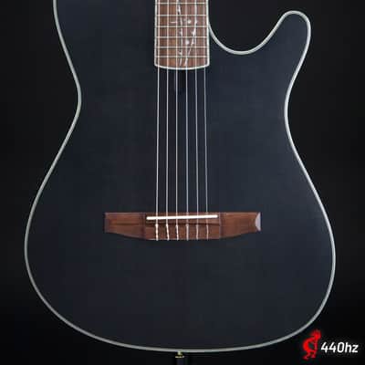 Ibanez Tim Henson Signature TOD10N Transparent Black Flat image 1