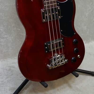 Vintage Brand VS4CR 4 String Short Scale SG bass guitar in cherry red finish - DC mini humbucker EBO image 3
