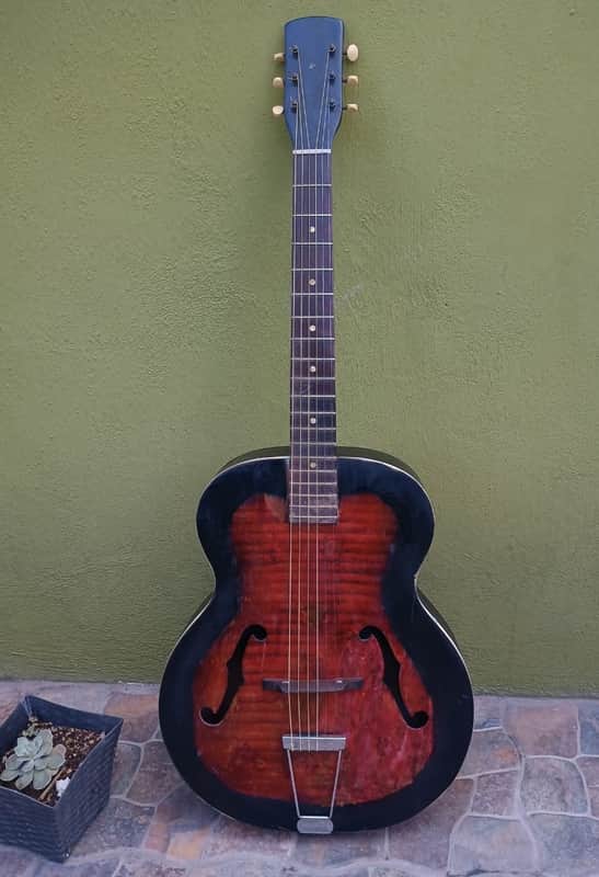 Vintage Harmony? acoustic Hollow arched top body guitar with F holes