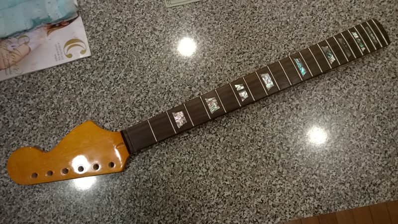 Fender Mustang  Amber/rosewood neck image 1