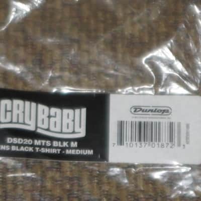 new in package (old stock) A+ genuine Dunlop DSD20-MTS-M Men's Cry Baby T-Shirt, Medium, 100% Cotton, Black, Short Sleeve, CRY BABY Graphic is in White (from 2010s) UPC # 710137018723 image 7
