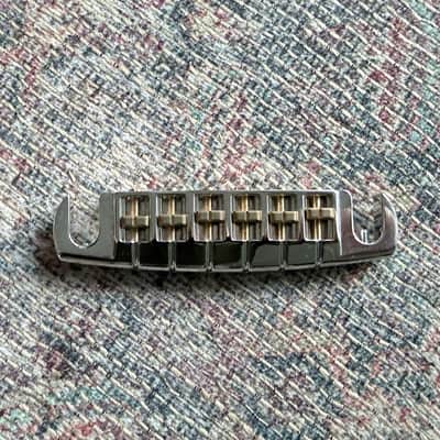Schaller Signum 2026 - Wraparound locking bridge - Nickel with brass saddles image 2