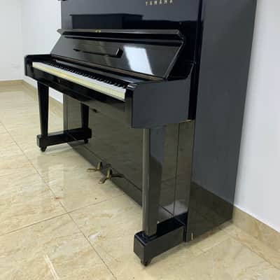Elegant Yamaha U1 Upright Piano – Timeless Sound & Style image 1