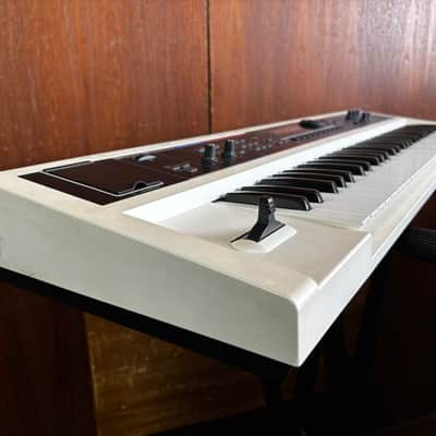 Roland Juno-Di Portable 61-key Mobile Synthesizer White color w/ bag power supply image 5