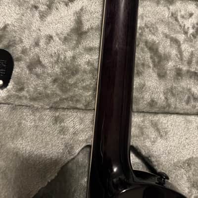2023 ESP LTD EC-1000 Deluxe Piezo See Thru Black w/Macassar Ebony fretboard, ESP case. image 8