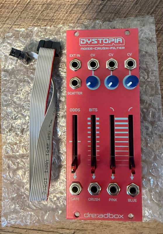 Red and silver electronic filter module with knobs and sliders.