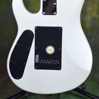 Sterling by Music Man JP70D John Petrucci 7 String Pearl White