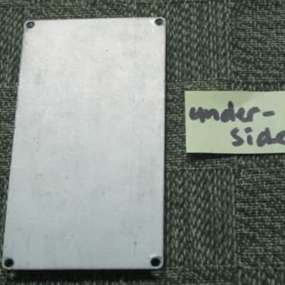 used medium relic'd genuine Boss Bottom Plate (Silver Label Taiwan) for compact (regular) size pedal, from March 1991 - PLATE PART: Metal w/ Silver Finish / BOTTOM LABEL: SLT / EXTERIOR PADDING: Black stiff hardened rubber - NO: pedal/screws/other items image 22