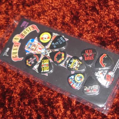 new in package (old stock) A+ Perri's Leather Ltd. / Perri's 12 Pack Of Guns N Roses Guitar Picks - Med Gauge - Celluloid Plastic, 351 shape - but slightly curved (LP12-GNR1) LP12GNR1 image 12