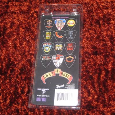 new in package (old stock) A+ Perri's Leather Ltd. / Perri's 12 Pack Of Guns N Roses Guitar Picks - Med Gauge - Celluloid Plastic, 351 shape - but slightly curved (LP12-GNR1) LP12GNR1 image 15