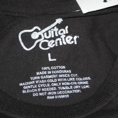 new in package A+ Guitar Center EAT BREATHE, ROCK Men's Size Large (L), Black 100% Cotton Short Sleeve T-Shirt - Graphic is in White and it says / shows: GUITAR CENTER EST. 1964, EAT, BREATHE, ROCK + has dual guitars, stars, & lines (Style # GC005-11730) image 2