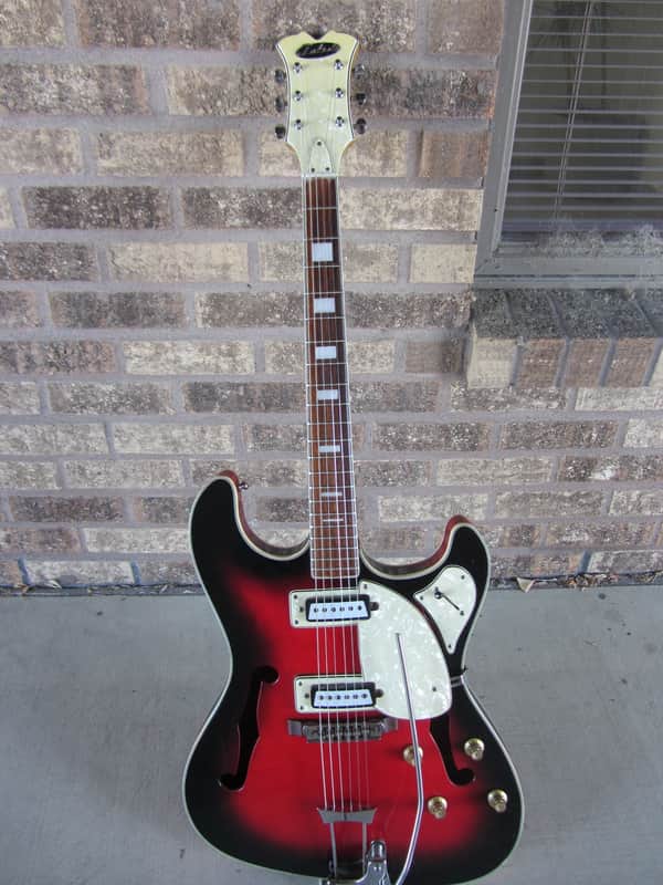 Toledo/Aria Bizarre Vibraslim Copy 60's red sunburst image 1
