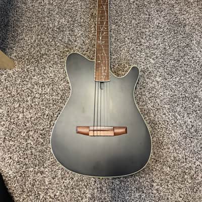 Ibanez TOD10N Tim Henson Signature 2022 - Present - Transparent Black Flat