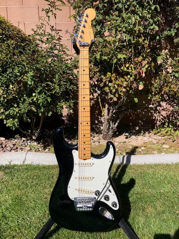 Vintage 1987 E Series Fender Squier MIJ Standard Stratocaster with System I Tremolo in Black image 1