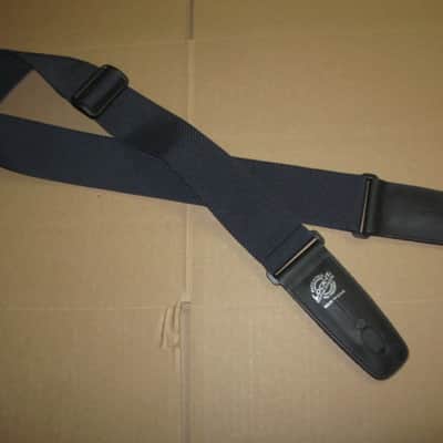 very lightly used Lock-It LIS-001-P2-BLK POLY PRO SERIES Black 2" guitar strap (2" wide, black polypropylene material, patented and brilliant Lock-It strap locking system, leather ends) straps, extend to an extra long 62" in max length image 1