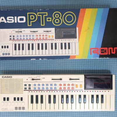 Vintage Casio PT-80 Electronic Keyboard W/ ROM Module Box Manual Very Clean 32-Key Mini Synthesizer Power Adapter No Corrosion on Battery image 2
