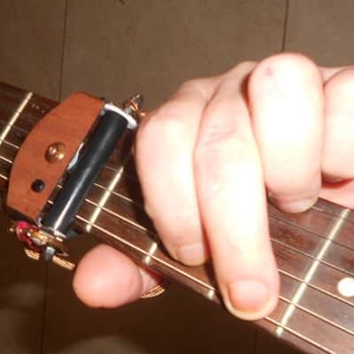 6th Finger Rolling Capo - brown real wood veneer. The fastest capo in the world ! image 3