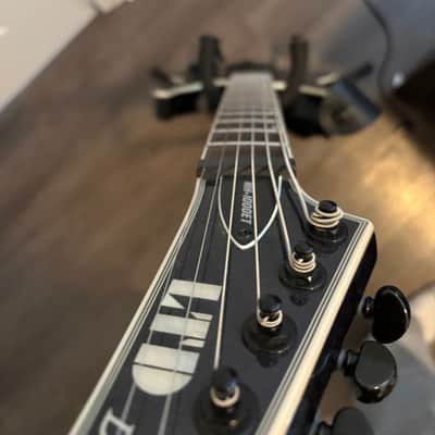 ESP LTD MH-1000 Evertune with Ebony Fretboard 2017 - Present - See Thru Black image 7