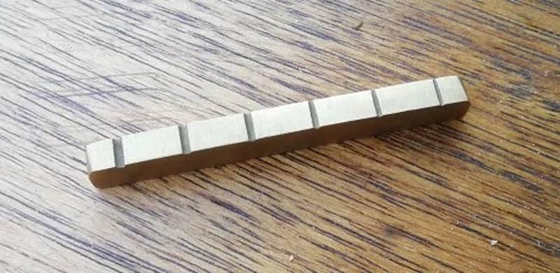 Anonymous 43 mm brass nut flat bottom (strat tele electric guitar) image 1