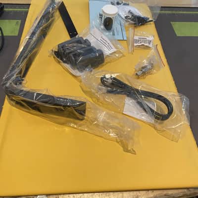 A smaller box of goodies that accompany a Shure Wireless System image 1