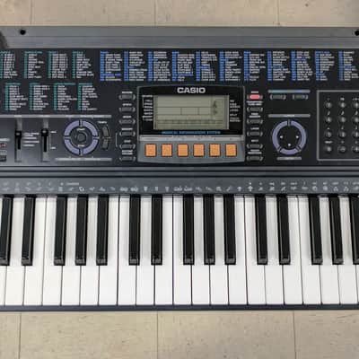 90’s Casio CTK-611 Keyboard, 61 Keys, Touch Sensitive, Drums, MIDI, Polyphonic image 1