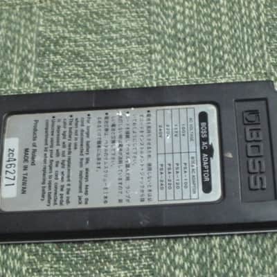 used medium relic'd genuine Boss Bottom Plate (Silver Label Taiwan) for compact (regular) size pedal, from March 1991 - PLATE PART: Metal w/ Silver Finish / BOTTOM LABEL: SLT / EXTERIOR PADDING: Black stiff hardened rubber - NO: pedal/screws/other items image 16