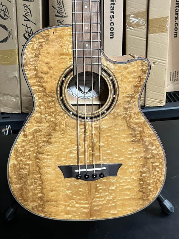 Get Your Hands on the Dean Exotica Quilt Ash Acoustic Bass - Gloss Natural!