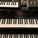 Dave Smith Instruments Prophet 08 PE 61-Key 8-Voice Polyphonic Synthesizer 2009 - 2015 Black with Wood Sides