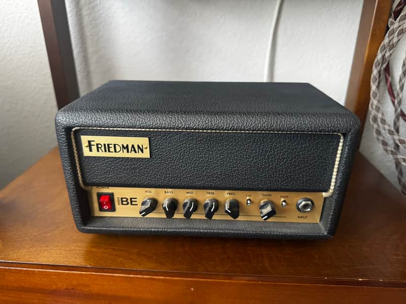 Black Friedman amplifier with silver knobs and front panel controls.