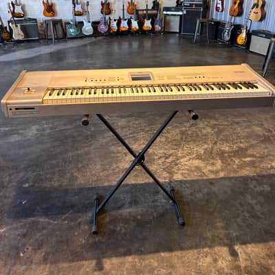 Korg Triton Studio 88-Key 120-Voice Polyphonic Workstation 2002 - 2005 - Silver