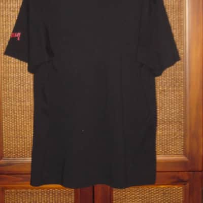 lightly worn genuine Gibson Firebird T-Shirt XL (X-Large), Black with Red Graphic, 60% Cotton / 40% Polyester - short sleeve GIBS-GA-FBBMXL (GA-FBBMXL) UPC # 711106533919, part of back neck area & right shoulder were re-stitched image 6