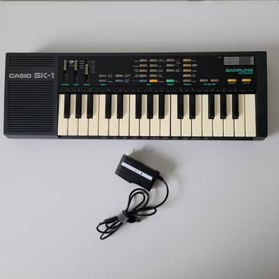 Cleaned Casio SK-1 with power adapter