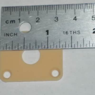 used (has some nicks & scratches) unknown brand CREME PLASTIC RECTANGLE Jack Plate + nickel finish SCREWS (refer to measurements in description) flat - but will flex when installed, might fit Epiphone LP 100 model guitar (NO guitar included) image 8