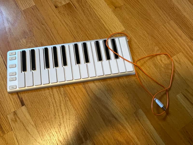 CME Xkey 25-Key Mobile USB Keyboard MIDI Controller 2010s - Silver image 1