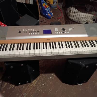 Yamaha YPG-635 88-Key Portable Grand Piano Keyboard with Matching Stand