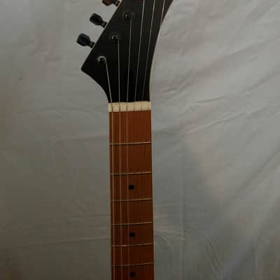 Trinity Bat-el'-ax image 12