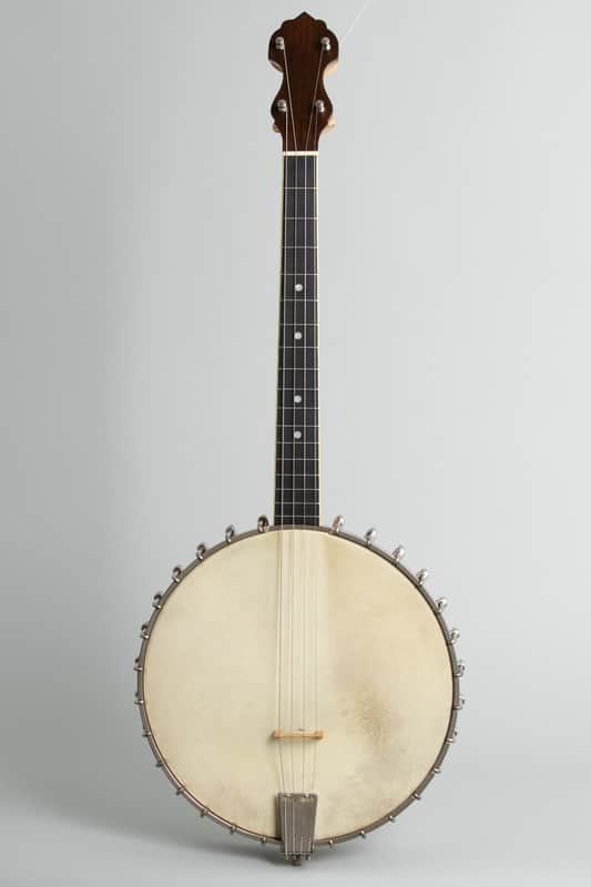 Vega Little Wonder Tenor Banjo (1922), ser. #54512, original black hard shell case.