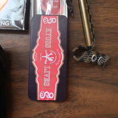 Quick I Have A Heavy Metal Gig Next Week 1 Guitar Strap 1 15 Foot Cable 2 Packs Neon DR Strings 9 Light Gauge With 1 Drop DR Tuning Pack 5 Heavy Hard Pick Set & Capo Neon luminescent (glow-in-the-dark) image 2